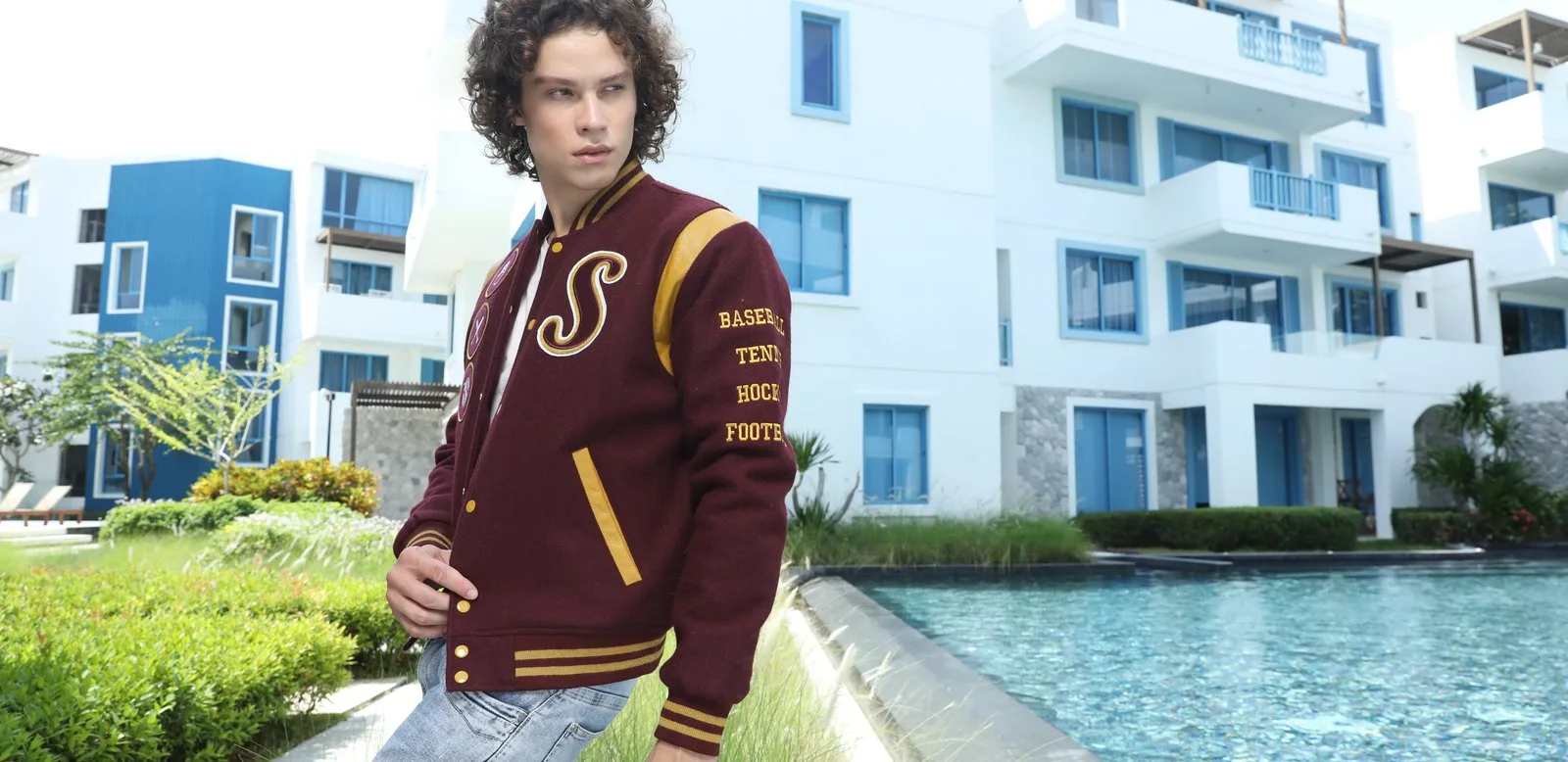 Custom maroon varsity letterman jacket with wool body and genuine leather sleeves